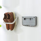Wall hanging slipper storage rack with suction mount holding brown slippers, plus empty tray