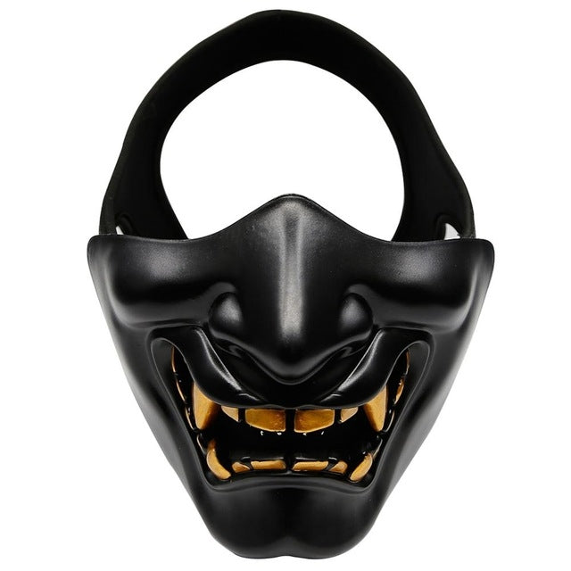 Black half-face tactical grimace mask with handle loop and toothy open-mouth grin