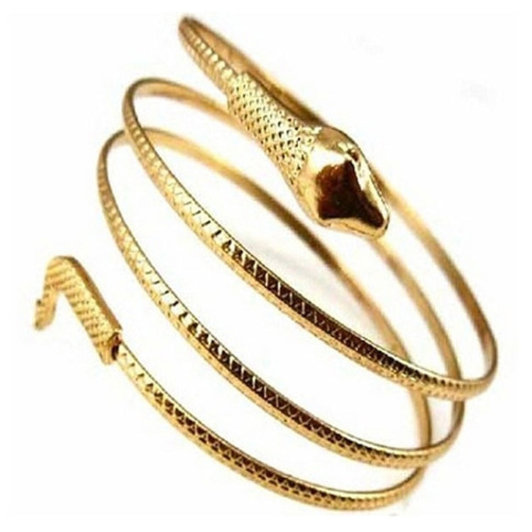 Twisted snake bangle bracelet set with three gold-tone cuffs, raised snake-head details