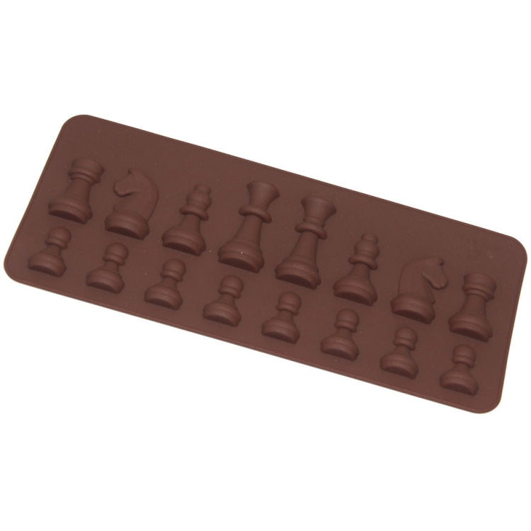 Silicone chess piece mold with raised cavities for king, queen, rook, and knight