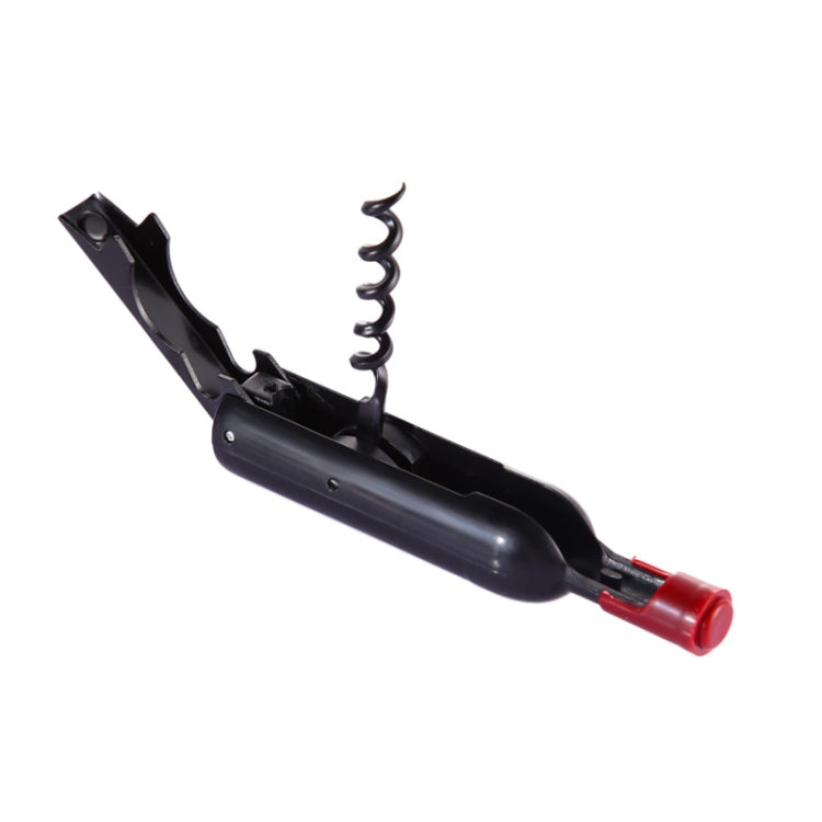 Black bottle opener with visible corkscrew and red handle end