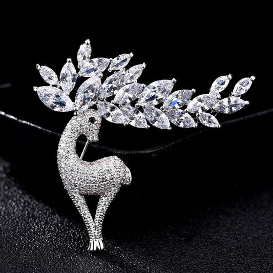 Silver-tone crystal deer brooch with marquise rhinestones antlers and dangling tail