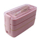 Pink 3-layer bento lunch box with clear snap lid and gold-trim locking bands
