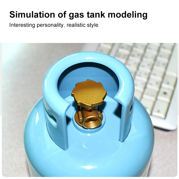 Blue simulated gas tank coin bank close-up of brass valve and open slot