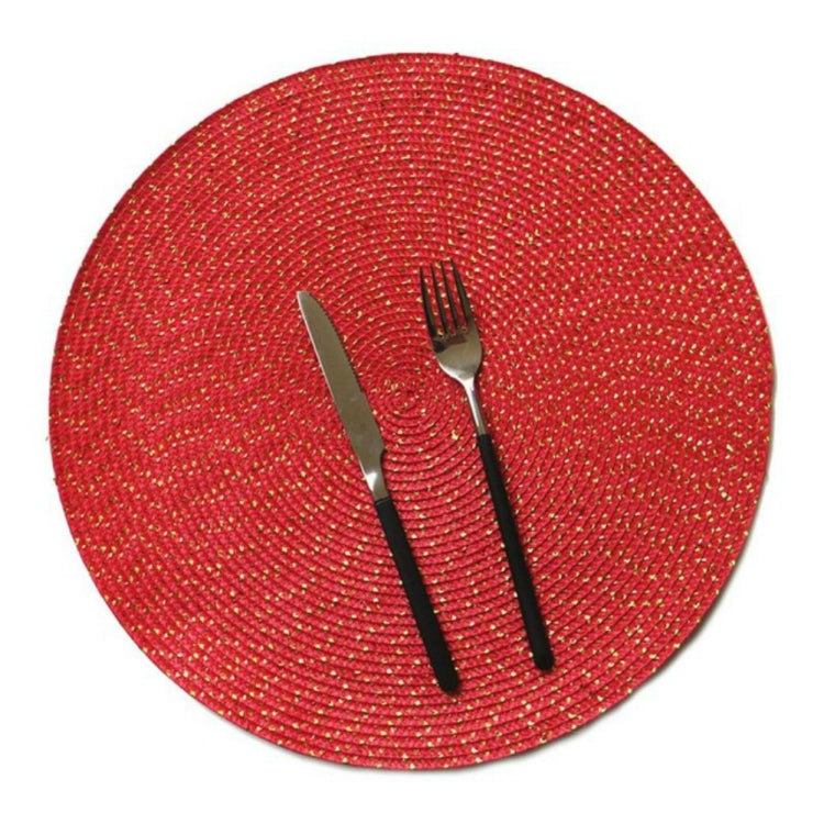 Round woven placemat in red with speckled texture and cutlery centerpiece