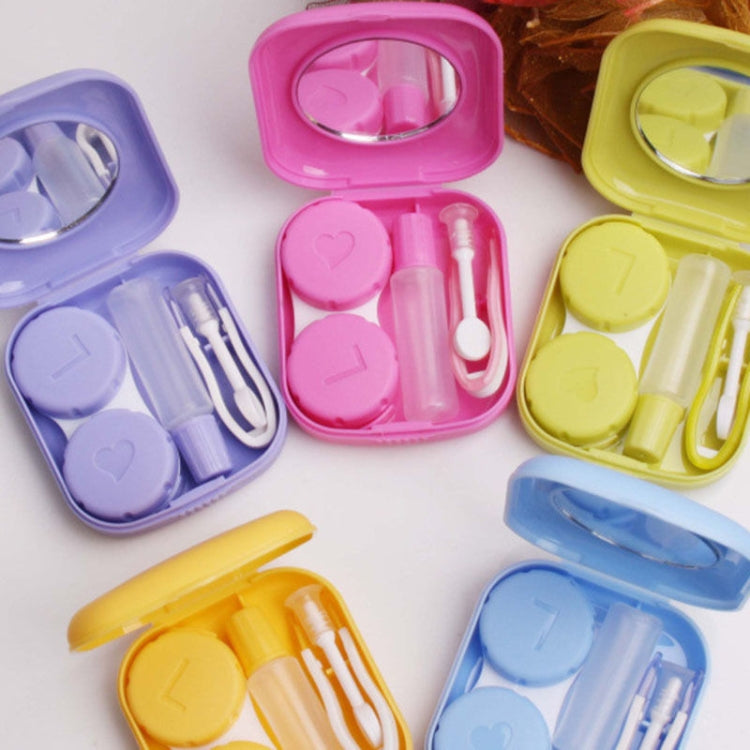 Set of mini square contact lens cases in pink, purple, and yellow with mirrors