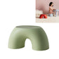 Green round kids stool with front cutout and flat top.