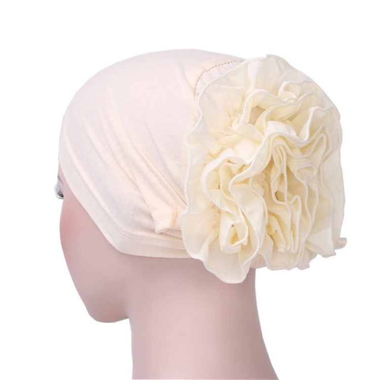Cream chiffon turban hat with large layered rosette flower