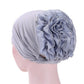Light blue chiffon turban hat with large layered rosette flower