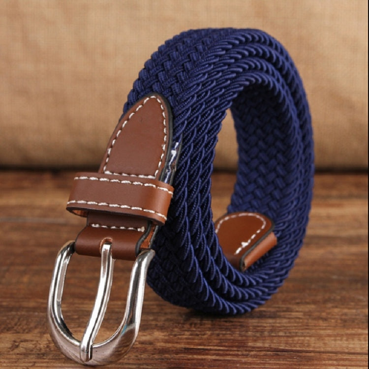 Narrow elastic canvas weave belt with navy braided strap and brown leather keeper, silver double-prong buckle.