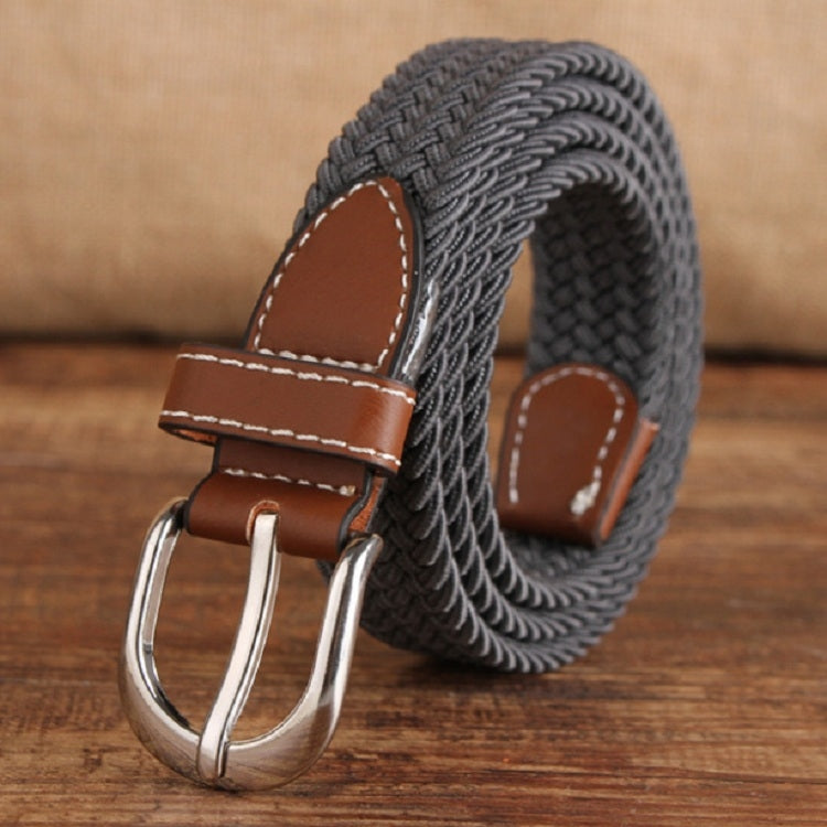 Narrow woven elastic belt with silver buckle, dark gray braided canvas, brown keeper.
