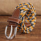 Braided elastic belt with silver double-prong buckle, brown leather tabs, black-gray-orange striped weave