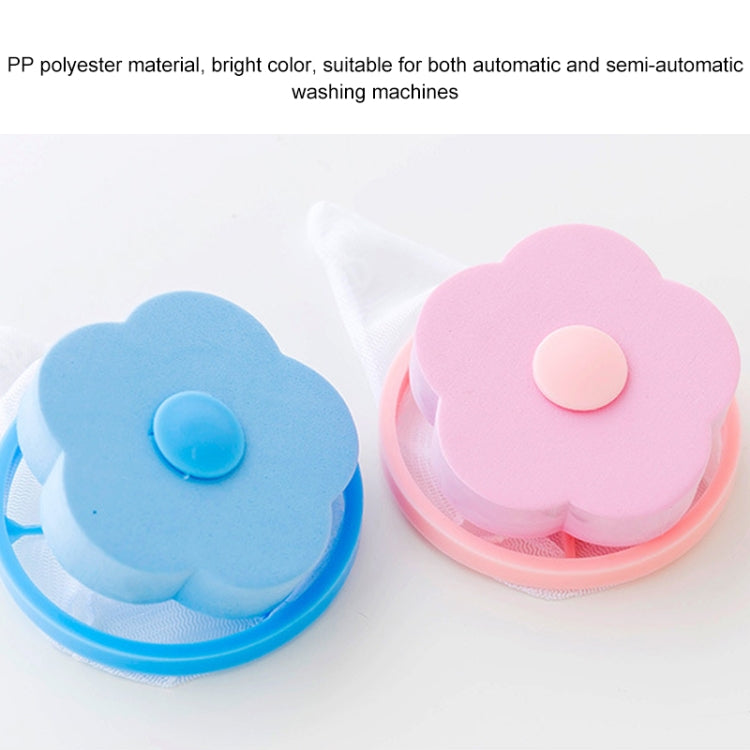 Blue and pink laundry filter balls with flower lids and circular release buttons
