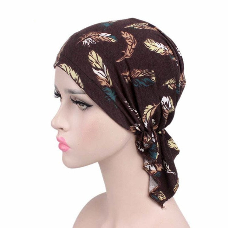 Dark feather-print stretch cotton turban cap with side knot drape
