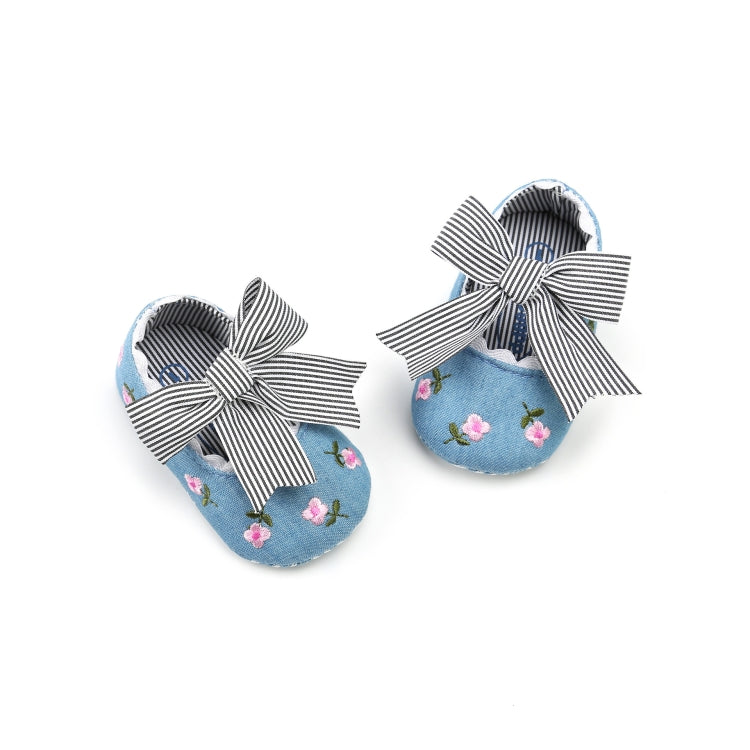 Toddler princess shoes in blue fabric with striped bows and floral print, soft sole