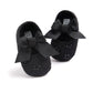 Toddler princess shoes in black with striped ribbon bow, textured upper, soft sole