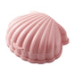 Pink seashell-shaped flip-top soap box with scalloped edges and hinge lid