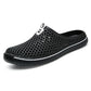 Black perforated slip-on clog sandals with breathable hollow design and padded sole
