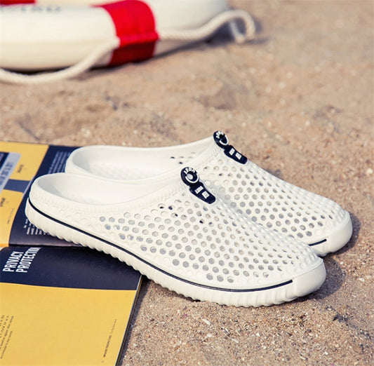 White breathable hollow slip-on sandals with perforated upper and dark trim