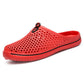 Red perforated slip-on beach sandal clog with cushioned sole and side opening