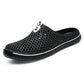 Black perforated breathable slip-on sandals with rounded toe and cushioned sole
