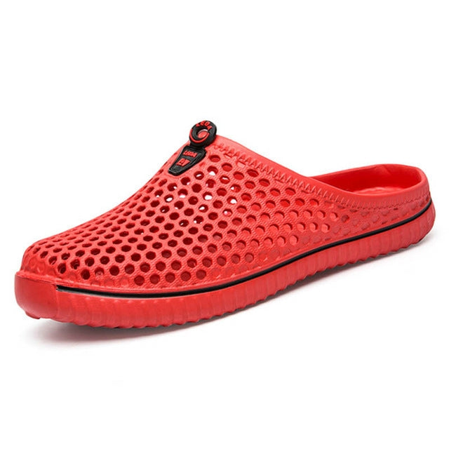 Red ventilated slip-on clog sandal with open back and black-edged upper