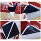 Triangular black non-slip stickers being applied and pressed onto floor surface.