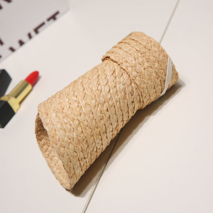 Woven straw visor hat rolled brim view with textured straw weave and strap.