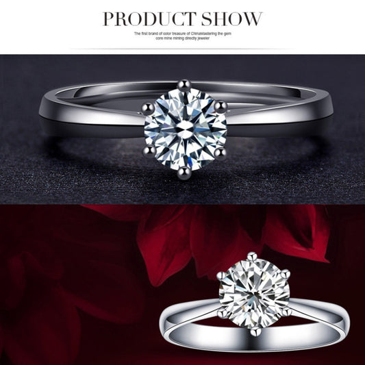 Silver-tone solitaire ring shown from the front and side, with a round six-prong stone.
