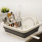 Dish rack with utensils and stacked plates, white rim and gray drain tray