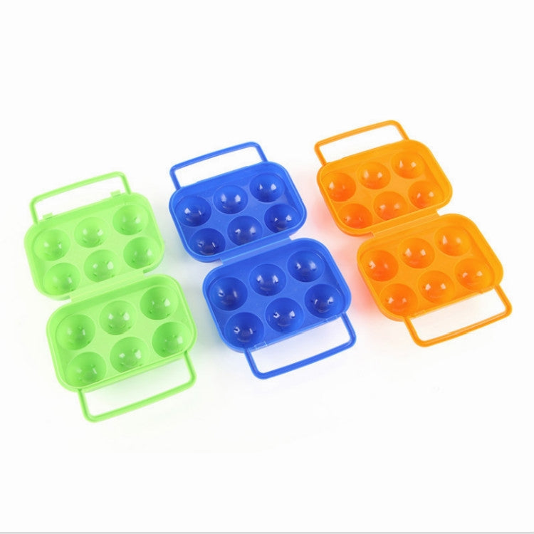 Six-egg plastic egg storage cases in green, blue, and orange colors