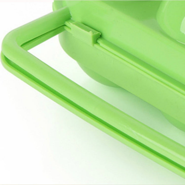 Green plastic 6-egg container case lid and carry handle detail