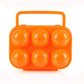 Orange 6-egg plastic egg storage case with carry handle, holding 6 orange eggs