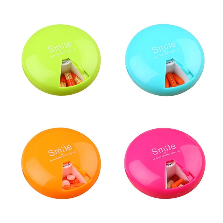 Color assortment of 7-day rotating pill containers: green, blue, orange, rose