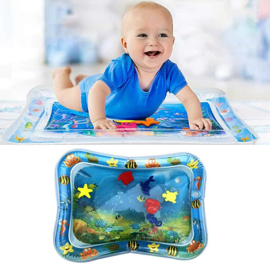 Baby playing on inflatable aquarium water play mat cushion with ocean animal design