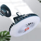 Portable fan lamp with white circular shroud, black fan blades, and clamp mount
