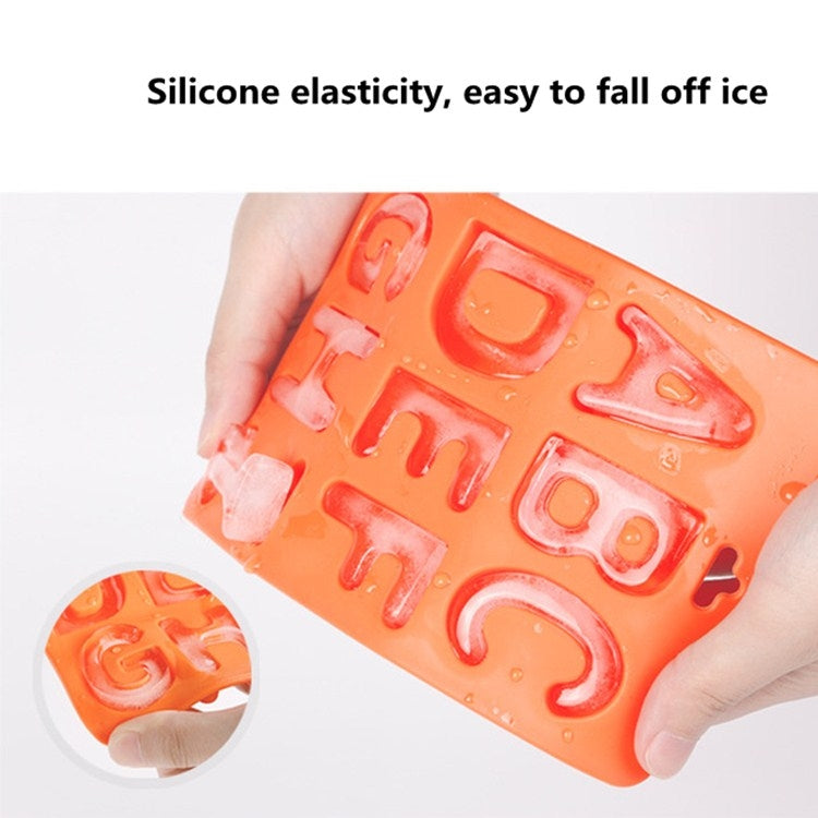 Orange silicone letter ice cube tray with A–Z molds held in hand
