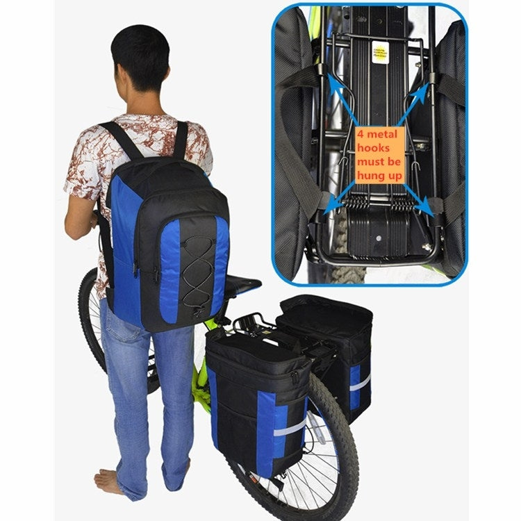 Mountain bike rear shelf bag in black with blue accents, worn on bike with adjustable straps