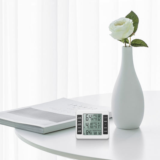 Wireless refrigerator thermometer with LCD screen, shown sitting on a countertop