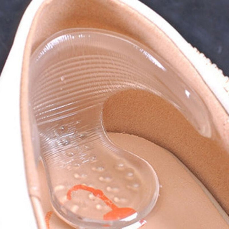 Clear T-shaped insole sticker close-up inside a high-heel shoe