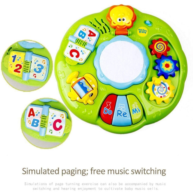 Green circular music learning drum with light-up center and ABC-style key panels