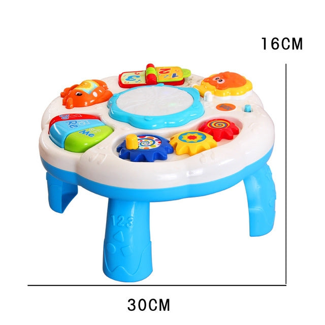 Kids musical drum table in white and blue with colorful activity buttons