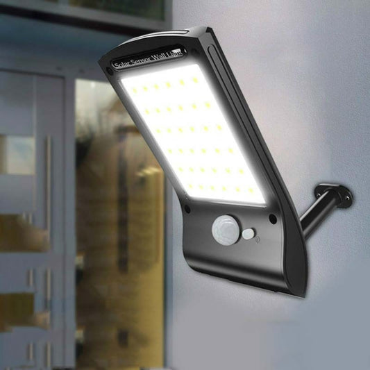 Solar wall light with motion sensor, bright LED panel in dark housing