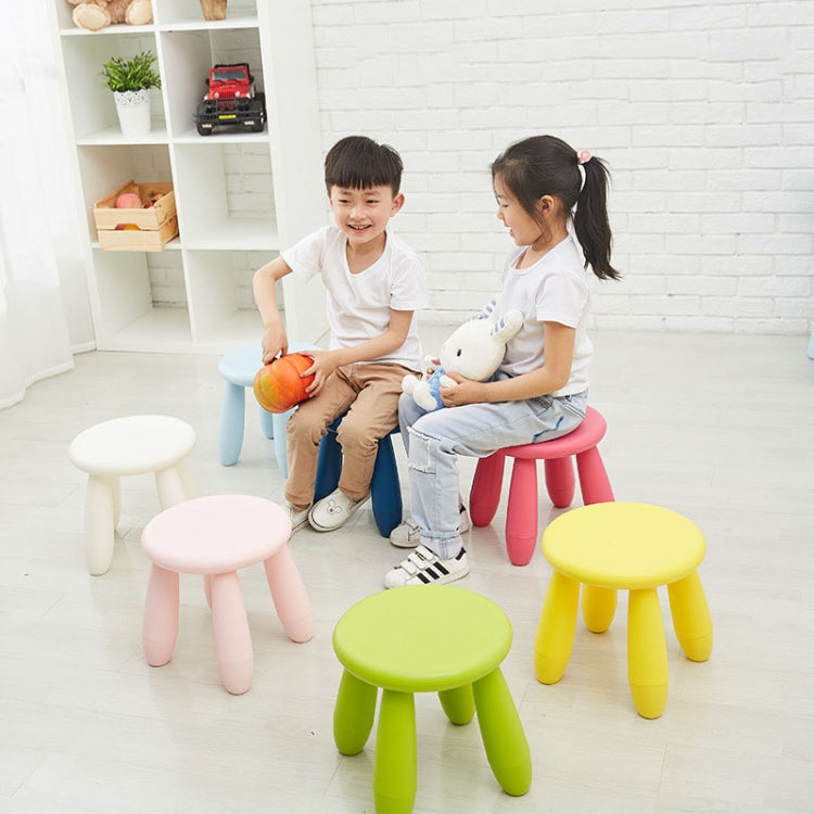 Colorful round plastic children’s stools in pastel colors
