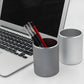 Silver/gray round metal pencil holder with black and red markers inside