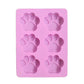 Purple silicone paw soap mold tray with six raised paw-print cavities