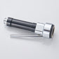Chrome and black handheld faucet nozzle with extended spray disc at the tip