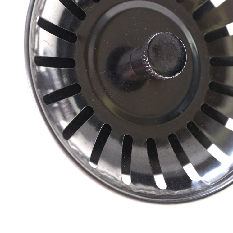 Stainless flume cover close-up with slotted ring and central circular insert