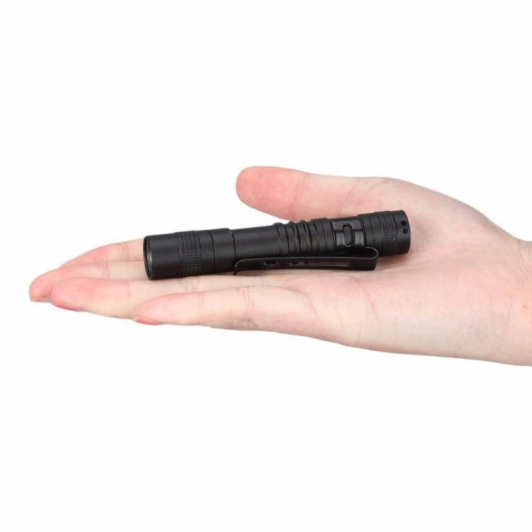 Black mini penlight LED flashlight shown in an open palm