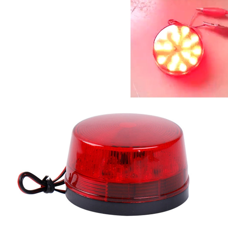 Mini LED strobe warning light with red transparent dome lens and black base